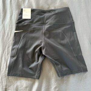 Women's Black Nike Athletic Compression Shorts with pockets